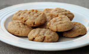 Prepared peanut butter cookies on a white plate